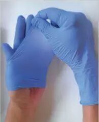 Dsenfilage gant jetable proprement sans dchirure